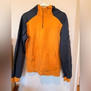 The North Face Blue and Orange Sleeve Patch